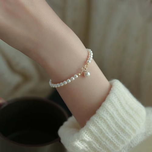 Gold Charm Pearl Bracelet